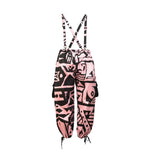 Detailed shot of Pink & Black Bagus Pants fabric showing sustainable cotton texture and cubist patternism.