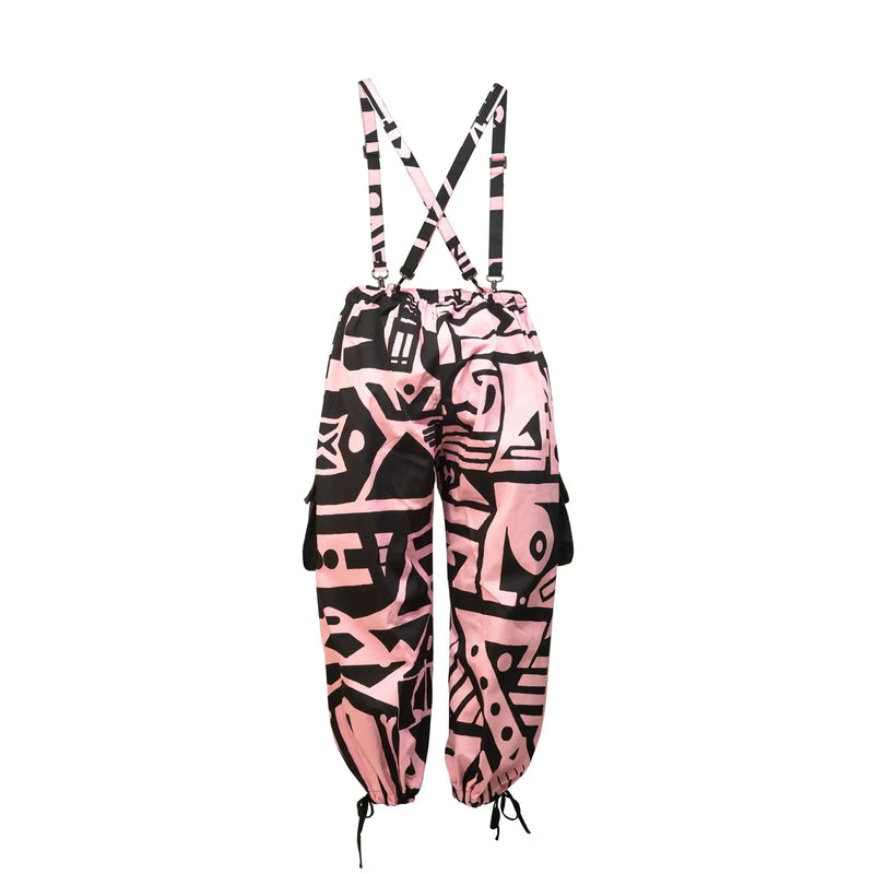 Detailed shot of Pink & Black Bagus Pants fabric showing sustainable cotton texture and cubist patternism.