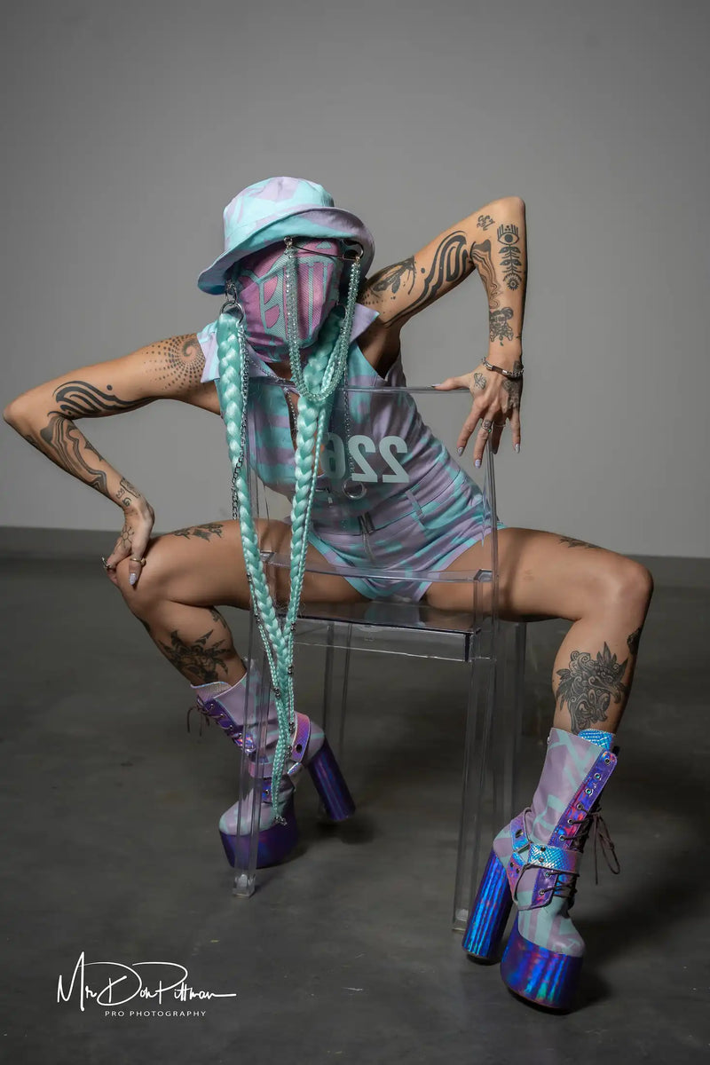 BAM-BAM Pastel Playsuit showing eco-conscious fabric and cubist-inspired pattern.
