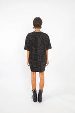 Back view of Charcoal and Black BAM-BAM Oversized Tee featuring cubist-inspired artwork.