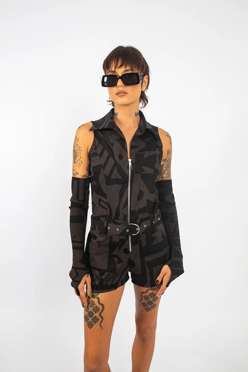 Model styling BAM-BAM charcoal Senshi playsuit with creative streetwear attitude.