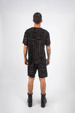 Back of Charcoal and Black BAM-BAM Oversized Tee captured in artistic streetwear styling.