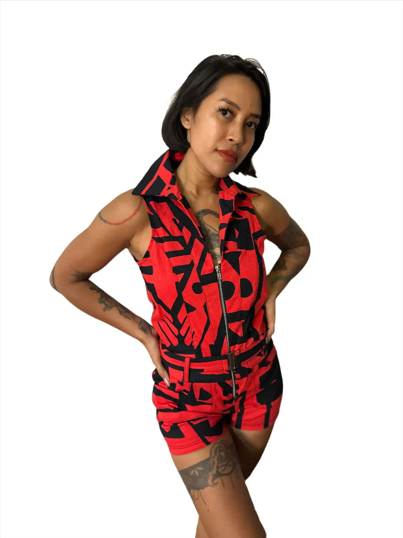 Red & Black BAM-BAM Playsuit highlighting artistic streetwear silhouette.