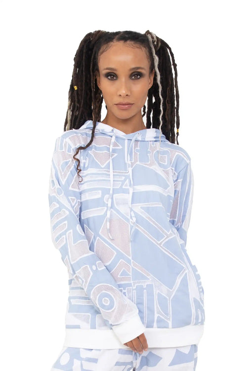 Close-up of ice-blue mesh BAM-BAM hoodie highlighting wearable art abstract prints