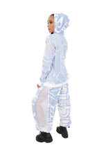 Detail shot of ice-blue mesh BAM-BAM hoodie highlighting cubist patternism, artistic sustainable fashion