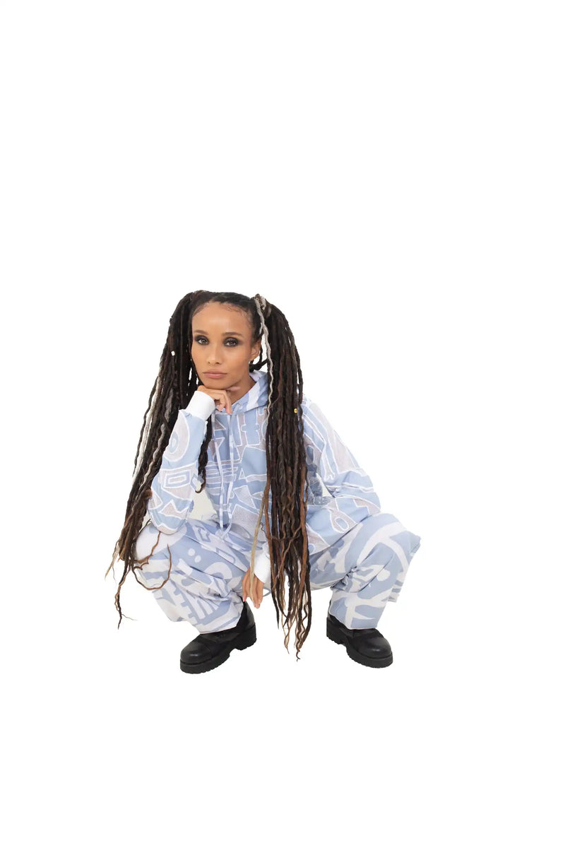 Styled ice-blue mesh BAM-BAM hoodie showing cubist patternism and sustainable wearable art