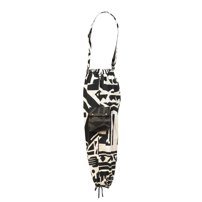 BAM-BAM black and white oversized overalls with bold graphic pattern, side product view.
