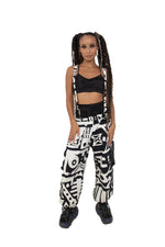 Female model wearing BAM‑BAM black and white bagus pants and matching bra top, showcasing cubist patternism