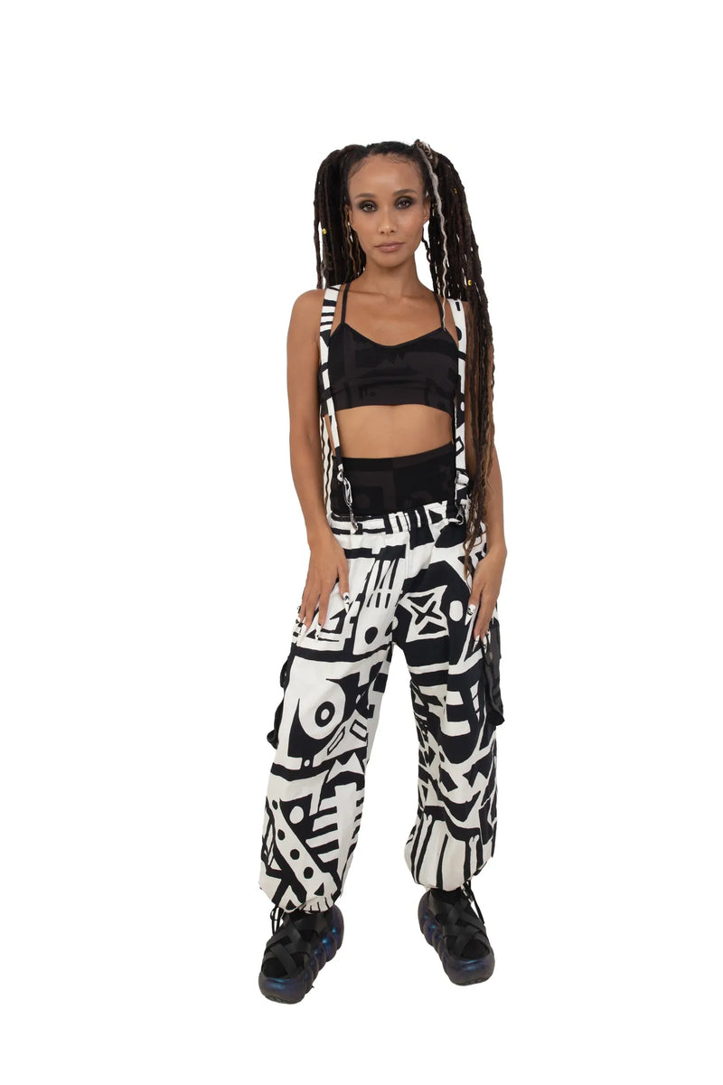 Female model wearing BAM‑BAM black and white bagus pants and matching bra top, showcasing cubist patternism