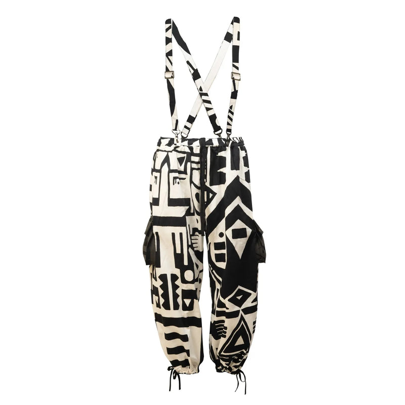 BAM-BAM black and white abstract print overalls with suspenders, product front view.