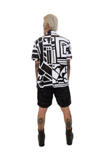 Close‑up of BAM‑BAM round mesh shirt fabric and circular cut‑out pattern reflecting artistic streetwear