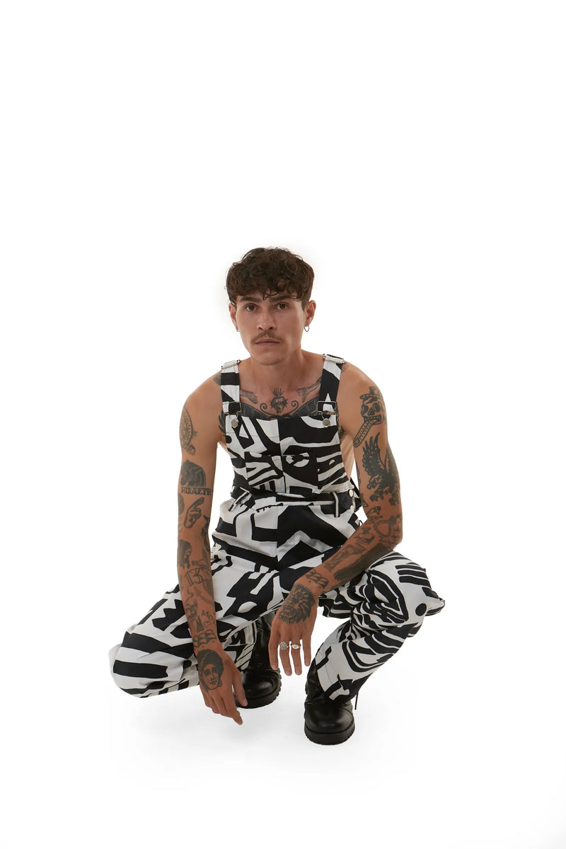 Model wearing black and white BAM‑BAM dungarees and demonstrating self‑expression