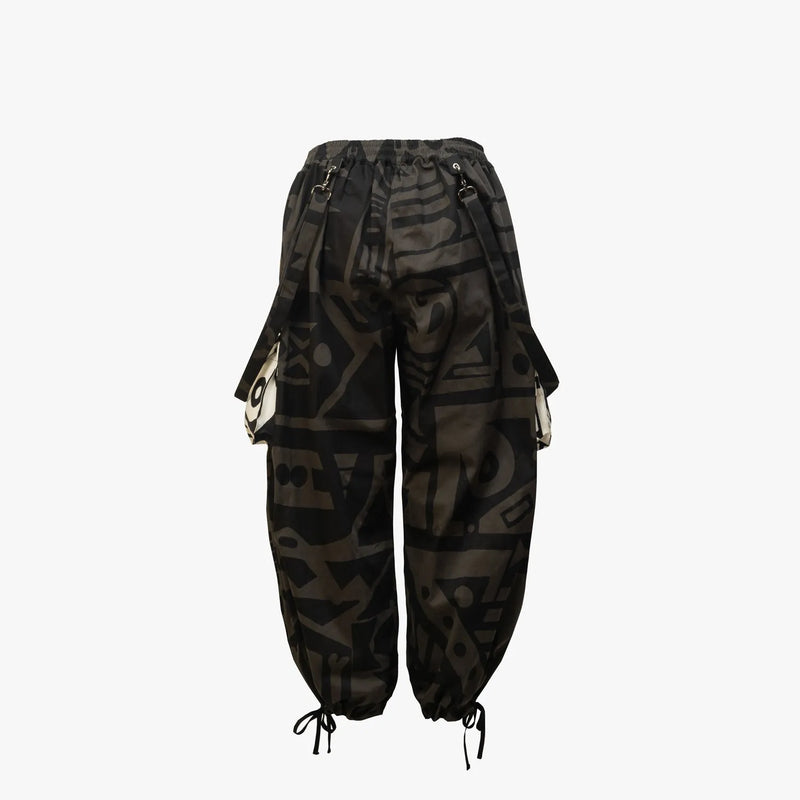 Back view of BAM‑BAM charcoal baggy pants with relaxed fit and sustainable streetwear design