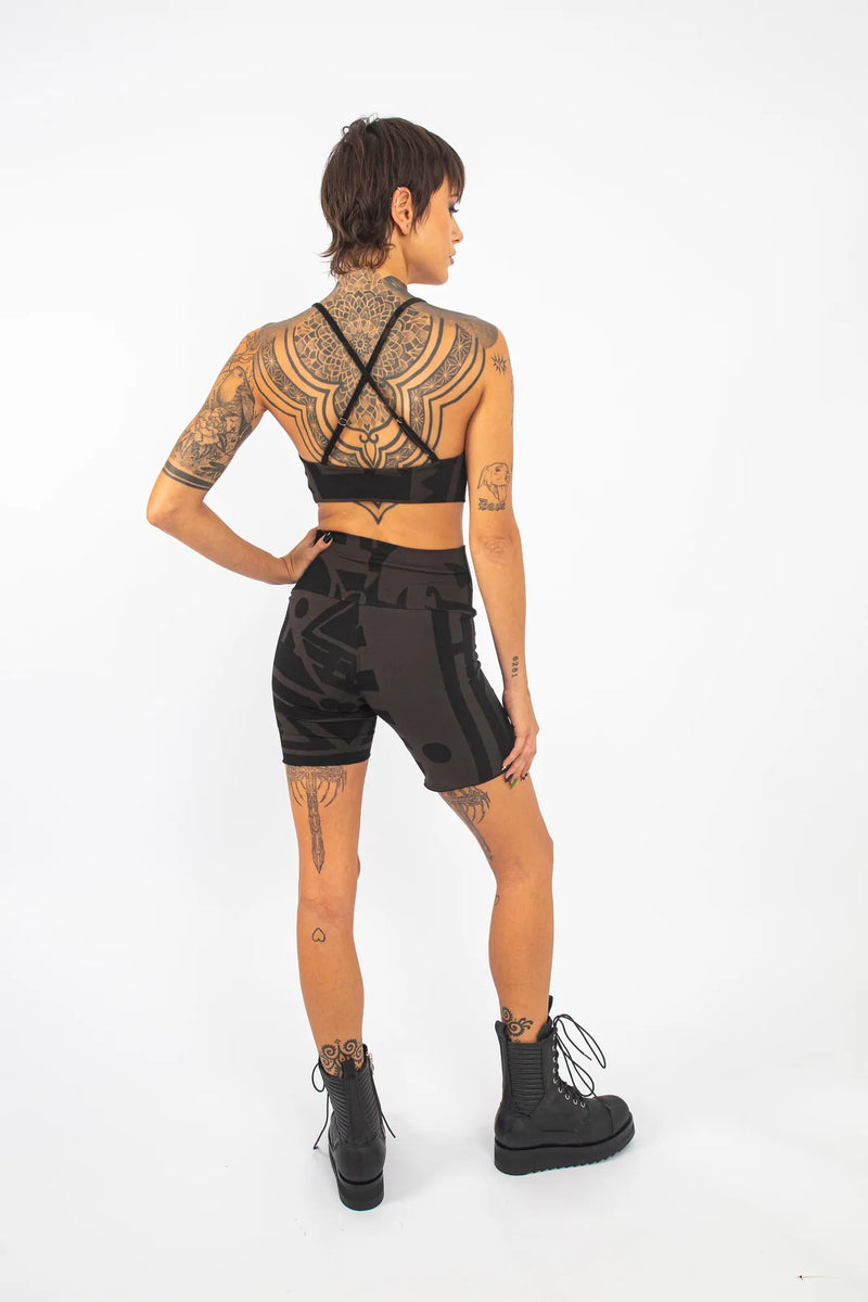 Back view of BAM‑BAM charcoal black bra top straps and neckline with artistic streetwear design