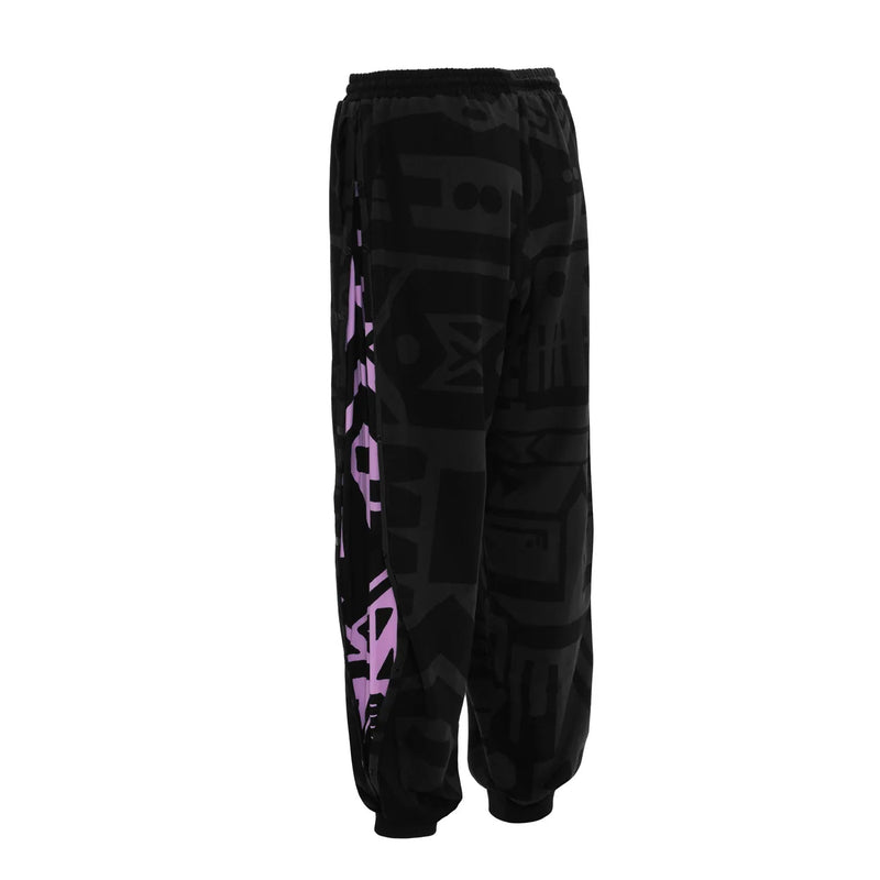 Close‑up of pocket and logo on BAM‑BAM charcoal and pink poppa pants with abstract prints