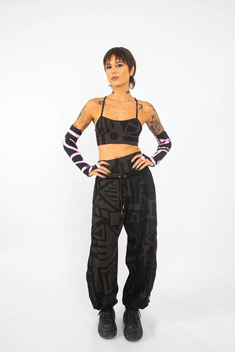 Back view of charcoal and pink BAM‑BAM poppa pants with detachable sides for sustainable streetwear style