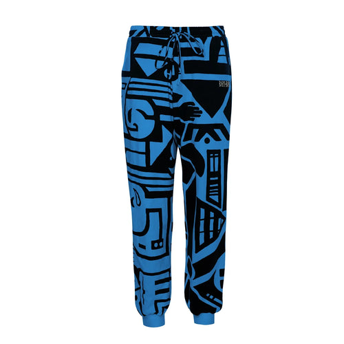 Flat lay of dark blue and black BAM‑BAM bamboo trousers with abstract prints and sustainable streetwear design