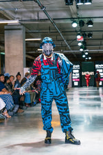 Close‑up of BAM‑BAM dungarees pocket and hardware detailing, celebrating sustainable streetwear