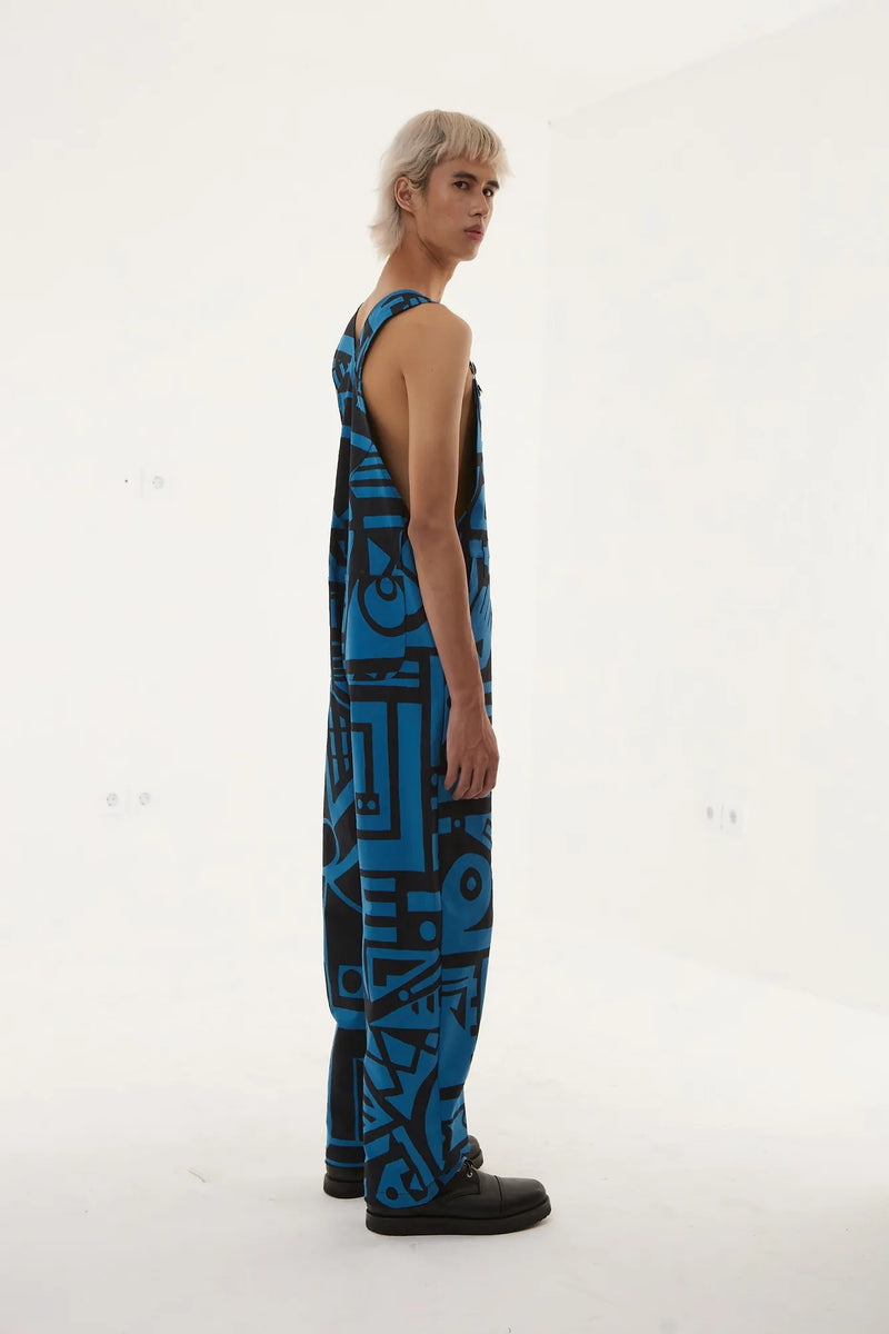 Group shot of models wearing dark blue BAM‑BAM dungarees highlighting cubist patternism and abstract prints