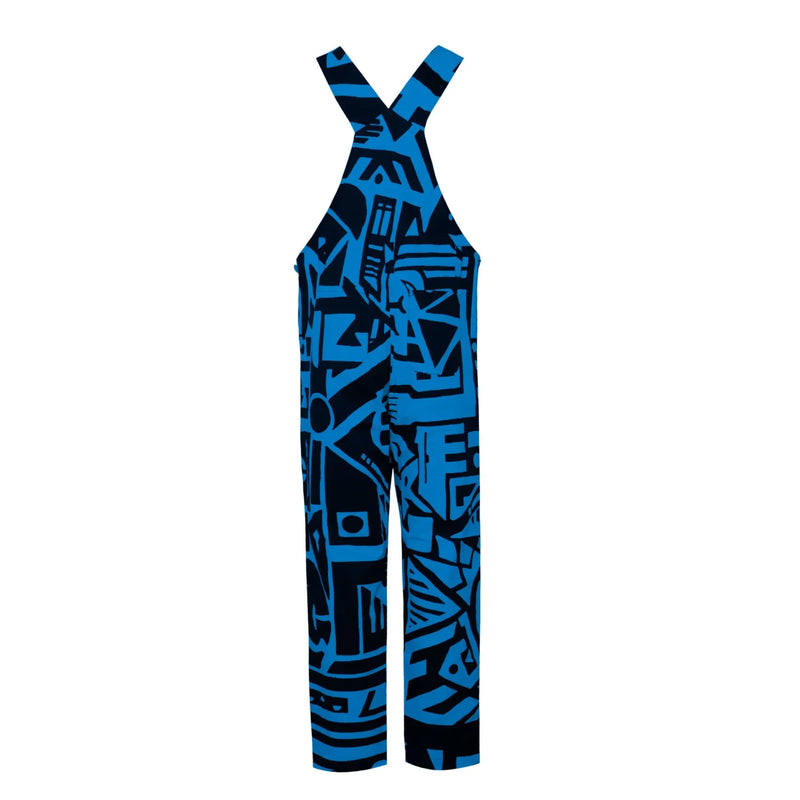 Male model wearing BAM‑BAM dungarees with bucket hat and jacket, featuring abstract prints and self‑expression