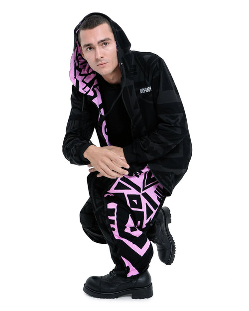 Reversible BAM‑BAM hoodie flipped to pink side revealing contrasting design and sustainable streetwear