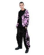 Reversible BAM‑BAM hoodie zipper and pocket details with abstract prints