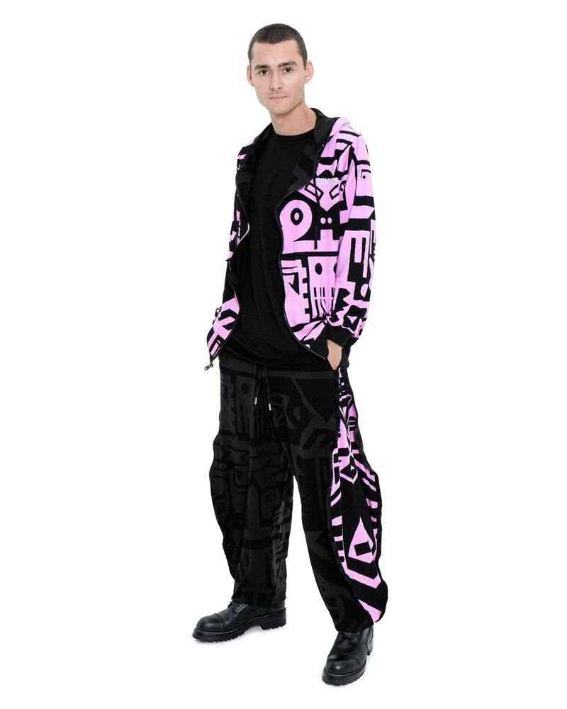 Reversible BAM‑BAM hoodie zipper and pocket details with abstract prints