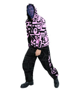 Model waering reversible charcoal and pink BAM‑BAM hoodie showing hood and sustainable streetwear design